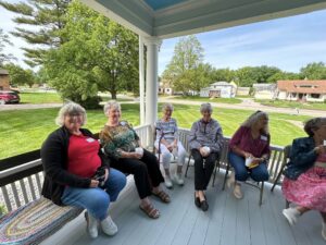 2026 coffee on porch alumni